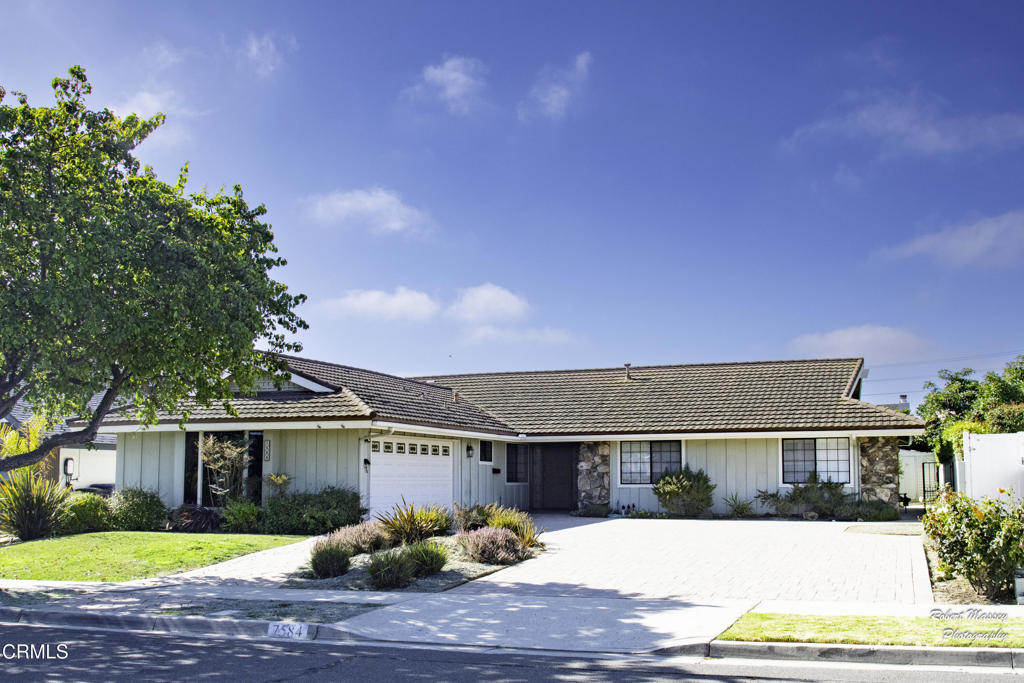 Welcome to this captivating single-level home, lovingly maintained by the original owner for nearly 60 years, settled in Ventura's highly coveted Presidential Place neighborhood. This property beautifully blends timeless charm with thoughtful modern updates, offering the lifestyle you've always dreamed of.Step into the heart of the home: a remodeled kitchen designed for both culinary adventures and casual gatherings. It features a spacious island with a cooktop, gleaming granite counters, updated cabinetry, recessed lighting, a custom built-in refrigerator, and double ovens. The versatile floor plan offers a formal living room with a cozy fireplace, an elegant dining room, and a comfortable family room conveniently located off the kitchen. French doors from the living room and open to a spacious rear yard, seamlessly connecting your indoor and outdoor living spaces.This home boasts four generous bedrooms, including a private primary suite with a remodeled bathroom and double closets. The guest bathroom is also beautifully remodeled with double sinks and modern fixtures. Enjoy the peace of mind that comes with modern updated exterior doors and windows, and the convenience of two separate water heaters. A dedicated laundry room and an attached two-car garage with built-in storage, a water softener, and a quiet, modern roll-up door complete the interior.Situated on a quiet street, the exterior delights with a custom stamped concrete oversized driveway, perfect for RV parking. The charming rear yard features a covered patio, a double-door shed for extra storage, a variety of mature fruit trees, and meticulously maintained landscaping. Living here means enjoying easy access to Juanamaria Park, scenic Harmon Canyon hiking trails, an array of local restaurants and shopping, top-rated schools, and Ventura's largest Community Park. This is more than a home; it's a legacy waiting for its next chapter.