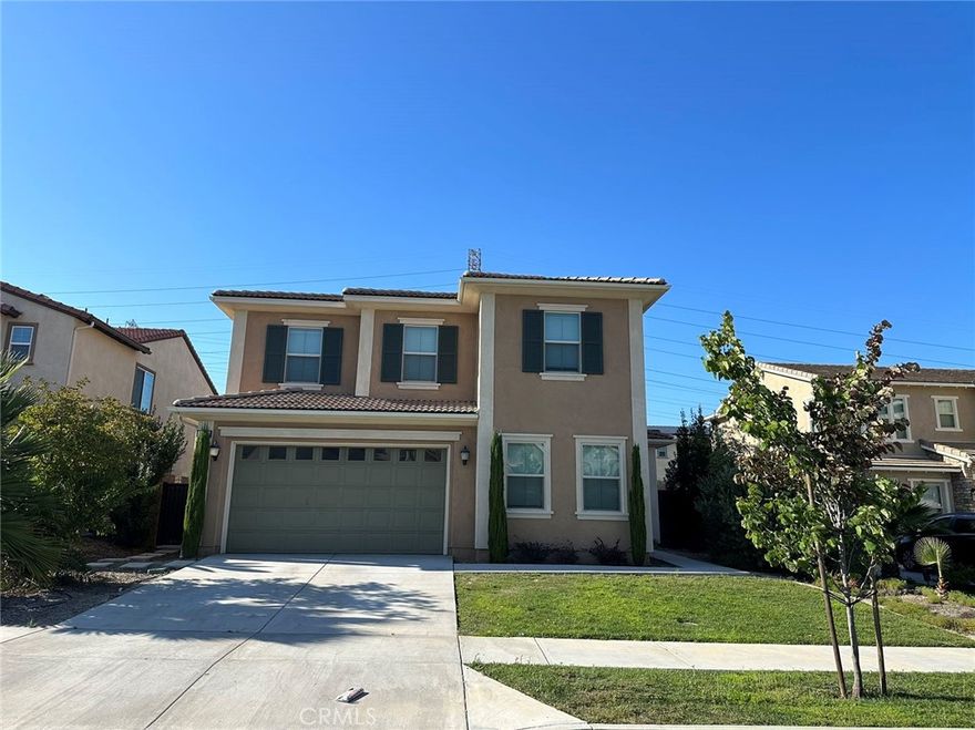 Great Home with 5 beds and 3.5 baths in Chino Hills. Included front and back yard landscaping adds visual appeal to this spacious two-story floor plan. At the center of the first floor is a large Great Room that seamlessly connects the kitchen, dining area, garage and a full-bath bedroom included. The kitchen showcases stainless steel appliances, granite countertops, an expansive island, and abundant cabinetry. The upstairs loft provides 4 bedrooms, a master bedroom with an adjacent covered deck. The master bath is a modern beauty with its designer oversized separate shower, luxurious soaking tub with custom cabinet front, dual vanities, and dual walk-in closets. Ready for moving in NOW.