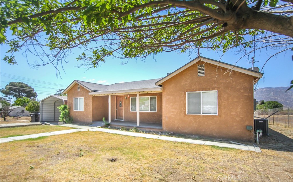 This home offers an excellent opportunity to enjoy comport, convenience and accessibility! Single story well-kept 3 bedrooms, 2 bathrooms home welcomes you with a warm living room featuring a wood-burning fireplace. The spacious kitchen offers plenty of counter space and ample cabinetry. An interior laundry area adds convenience and functionality. Additional features include a 2 car attached garage, aluminum carport, and RV parking, set on nearly an acre of land, this property offers a rare opportunity for expansion, or future development. With a 39,204 sq ft lot, there's ample space for outdoor living, gardens, a pool, or potential additions. Conveniently located minutes from freeways, shopping center, schools, Casino Morongo, Cabazon Outlets.