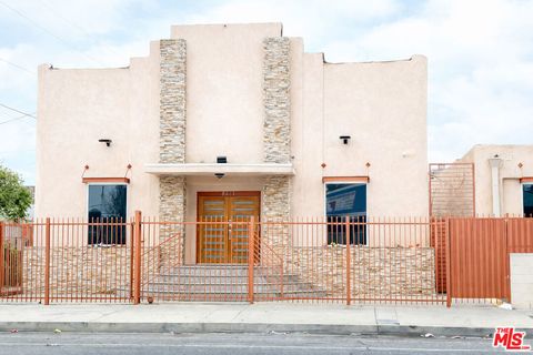 Photo of 8461 S San Pedro Street, Los Angeles, CA 90003 (MLS # 26639655)