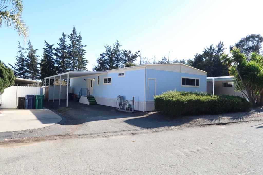 For as little as 20% down payment, you can call this home. This home has had significant upgrades done: New dual pane windows and sliding doors, entirely new exterior siding and skirt as well as updated exterior light fixtures and fresh paint inside and out. There is ample living space to entertain family and friends with a bar adjacent to the large front patio. It's the perfect spot to enjoy your morning coffee or soak up the sun in the evening. There's a cozy gas stove in the living room. There is plenty of extra space for a home office. The separate dining area as well as eat in kitchen provide an abundance of area for seating. The guest bathroom has a stall shower and the master bedroom has a bathroom with a bathtub and shower. There is plenty of closet space throughout. This home is ready for its new owners. All buyers MUST be preapproved, preferably with Murphy's Banks at 877-225-0318.