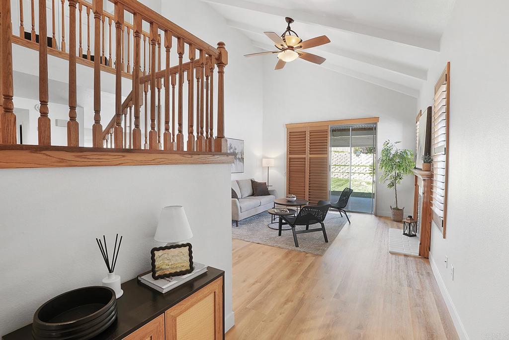 Welcome to this beautifully maintained 2-story home in a secure gated community! Featuring 3 bedrooms, 2 bathrooms, and a spacious open-concept layout, this move-in-ready home offers both comfort and style. Enjoy high ceilings, a bright and airy feel, a 2-car garage, and paid-off solar panels, saving you money from day one. Conveniently located near shopping, dining, and major freeways, this home checks all the boxes!