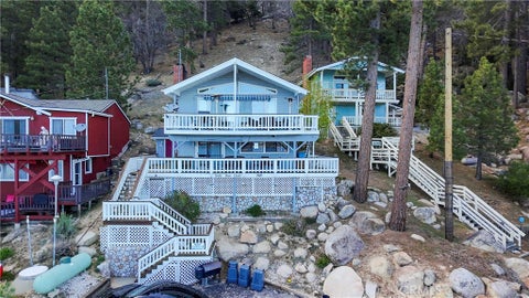 Photo of 38626 N Shore Drive, Fawnskin, CA 92333 (MLS # PF26199986)