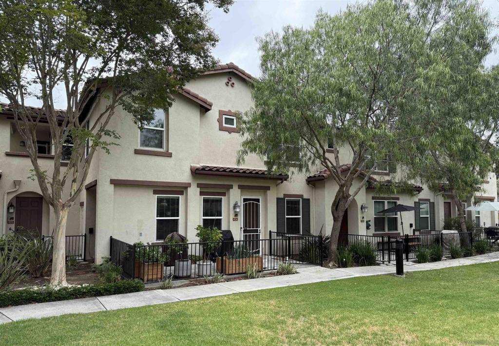 Commuter’s Paradise in Vista – Modern, Spacious, & Walkable! Discover the perfect blend of comfort and convenience in this 3 bed, 2.5 bath townhome offering the largest floorplan in the community (1,378 sq. ft.). Located in Vista, “America’s Climate Wonderland,” you’re just a 5-minute walk to the NCTD Sprinter, connecting you to Amtrak, Coaster, Metrolink, CSU San Marcos, Downtown San Diego, Orange County, and LA—perfect for daily commuters or investors. Enjoy a private, secure, inward-facing unit that opens to a community playground—ideal for families. The spacious primary suite features two walk-in closets and a dual vanity, while a separate laundry nook keeps living spaces clutter-free. Upgrades include: Modern LVP flooring, Toto Drake toilets, ceiling fans, and upgraded A/C. Fully integrated smart home w/ dimmable LED lighting in every room. Walk to Vista Village (Cinepolis, The Wave, Frazier Farms) and the vibrant Downtown Vista scene of breweries, eateries, and entertainment. Just 8 miles to the coast! This home offers space, smart living, and unbeatable access—schedule your tour today!
