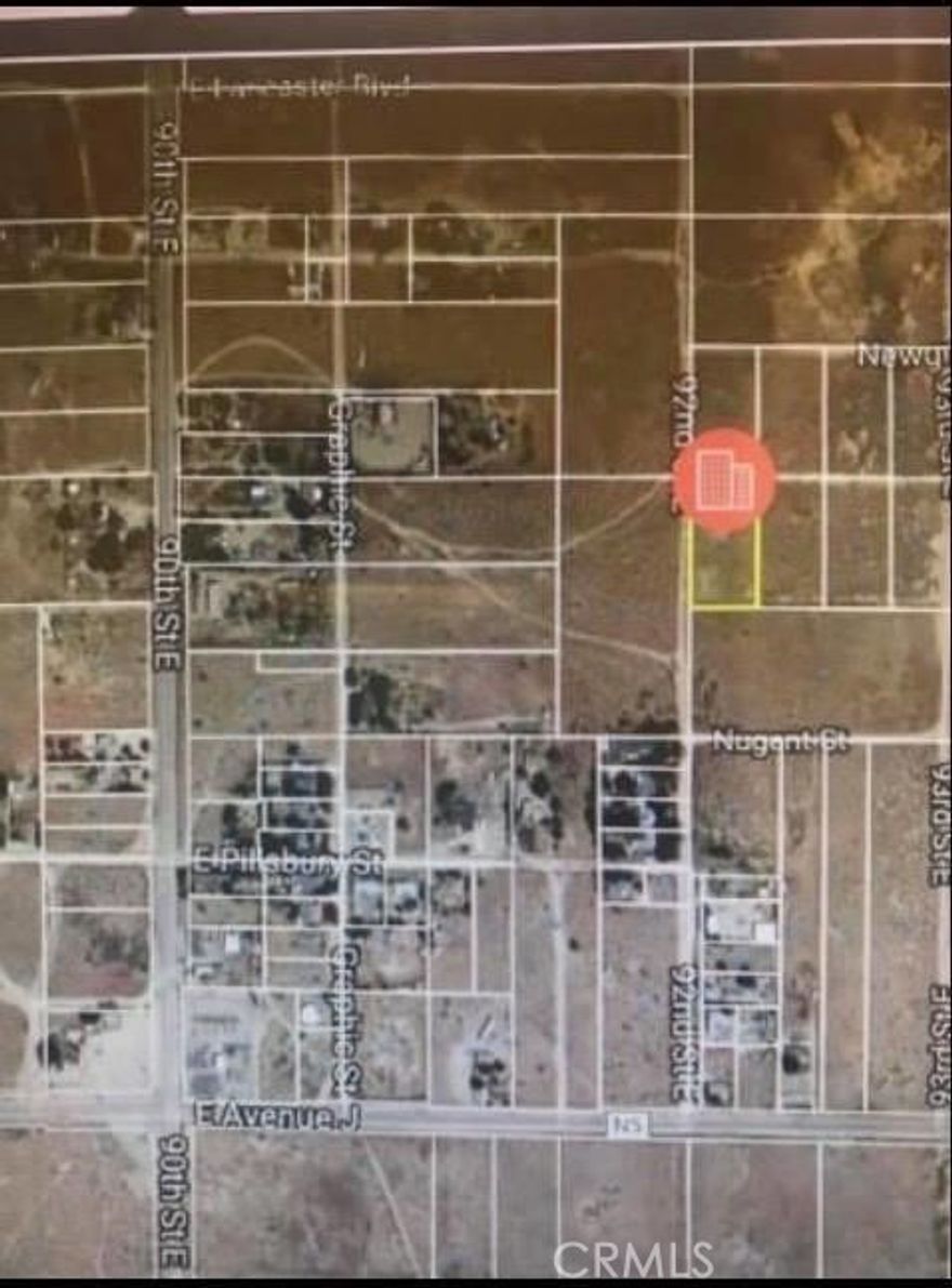 Vacant lot off 92nd Street East with water meter. This property is fenced