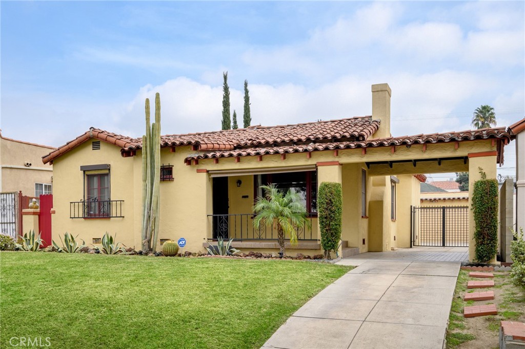 Welcome to this beautifully updated 1936 Spanish-style home, where timeless character meets modern comfort. Nestled on a picturesque tree-lined street, this property exudes warmth and charm from the moment you arrive.
Step inside to find inviting hardwood floors that flow throughout, complementing the home’s bright and airy layout. The spacious living and dining rooms are filled with natural light from large windows, creating the perfect atmosphere for both relaxing and entertaining. The updated kitchen features stylish finishes, ample counter space, and a seamless connection to the rest of the living area.
The main home offers two bedrooms and one and a half bathrooms, including a full bath with both a bathtub and shower, and a convenient half bath within one of the bedrooms.
The backyard is a private oasis — expansive, lush, and beautifully landscaped with mature fruit trees. It’s the perfect setting for outdoor dining, gardening, or simply enjoying a sunny afternoon.
Adding exceptional versatility, the property includes a studio ADU complete with a screened-in porch, full kitchen, and full bath. With alley access and an ADU which offers endless opportunities for guest accommodations, rental income, or a private workspace.
Located just minutes from Whole Foods, the new Erewhon, The Americana at Brand, and an array of shopping and dining options, this home combines classic Los Angeles charm with unbeatable convenience and style all in the heart of Glendale.
Broker/Agent does not guarantee the accuracy of information, including square footage or zoning. Buyer to verify all information to their satisfaction.