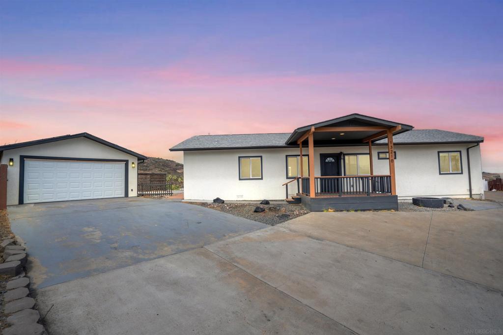 The view will stop you in your tracks—and the income potential will seal the deal. Whether you're dreaming of multi-generational living, smart investment income, or just some extra space to work or play from home, this private, turn-key property delivers it all. Perched on a quiet cul-de-sac with panoramic mountain and valley views, this home invites you to relax, recharge, and thrive. Step into a beautifully remodeled interior with high-end finishes—LVP flooring, decorative wood beams, designer lighting, and new Samsung appliances in a bright, open-concept layout. The detached ADU (with its own entrance, yard, and stunning views) offers unmatched flexibility for guests, family, or rental cash flow. Outdoors, the 15,000 sq ft lot is equally impressive: RV hookups, an expansive garage with workshop, and a massive view deck perfect for sunset gatherings. With paid solar, a recirculating hot water system, and every detail dialed in, this property blends comfort, style, and function—inside and out.