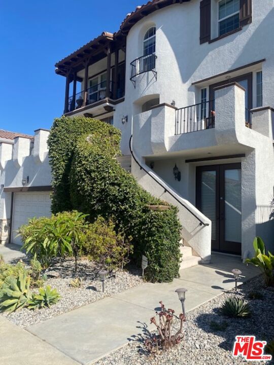 Nestled in the highly sought-after Oak Hill Estates community of Monterey Hills/Highland Park, this stunning residence offers a perfect blend of elegance, comfort, and convenience. Inside, you'll find four spacious bedrooms, two full bathrooms, one half bathroom, and a newly added three-quarter bathroom, providing added flexibility and functionality. An executive office, ideal for working from home, is right off the Primary Bedroom. The kitchen features granite countertops and opens into a bright, open-concept living room filled with natural light and enhanced by rich hardwood flooring. Step out onto the extensive back patio, accessed from both the second and third floors, for al fresco dining in a tranquil setting, complete with a BBQ, fire pit, and cozy seating area. A charming balcony off one of the bedrooms showcases breathtaking city views. Perfectly located just over a mile from vibrant Highland Park and quiet South Pasadena, with easy access to recreational parks, hiking trails, and dog parks, plus proximity to more shopping, dining, the South Fair Oaks Corridor, Old Town Pasadena, and DTLA.
