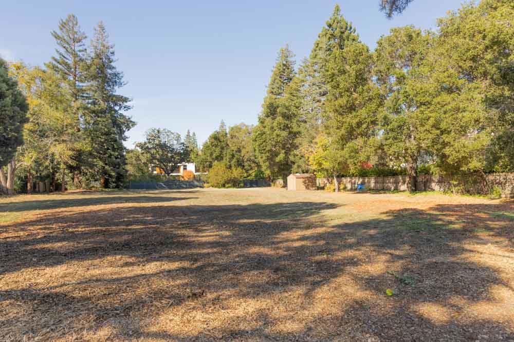 Embrace a truly unique opportunity to construct your dream home in the highly sought-after Circus Club area of Atherton. Situated amidst the prestigious surroundings of this exclusive neighborhood, this property promises a lifestyle of opulence and sophistication. Whether you envision a modern architectural masterpiece or a classic estate, this opportunity allows you to tailor every detail to your unique taste and preferences. Enjoy the perfect balance of tranquility and accessibility, with close proximity to the charming downtown of Menlo Park and neighborhood schools ensuring an exceptional educational environment. Seize the chance to build your dream in this coveted Atherton location.
