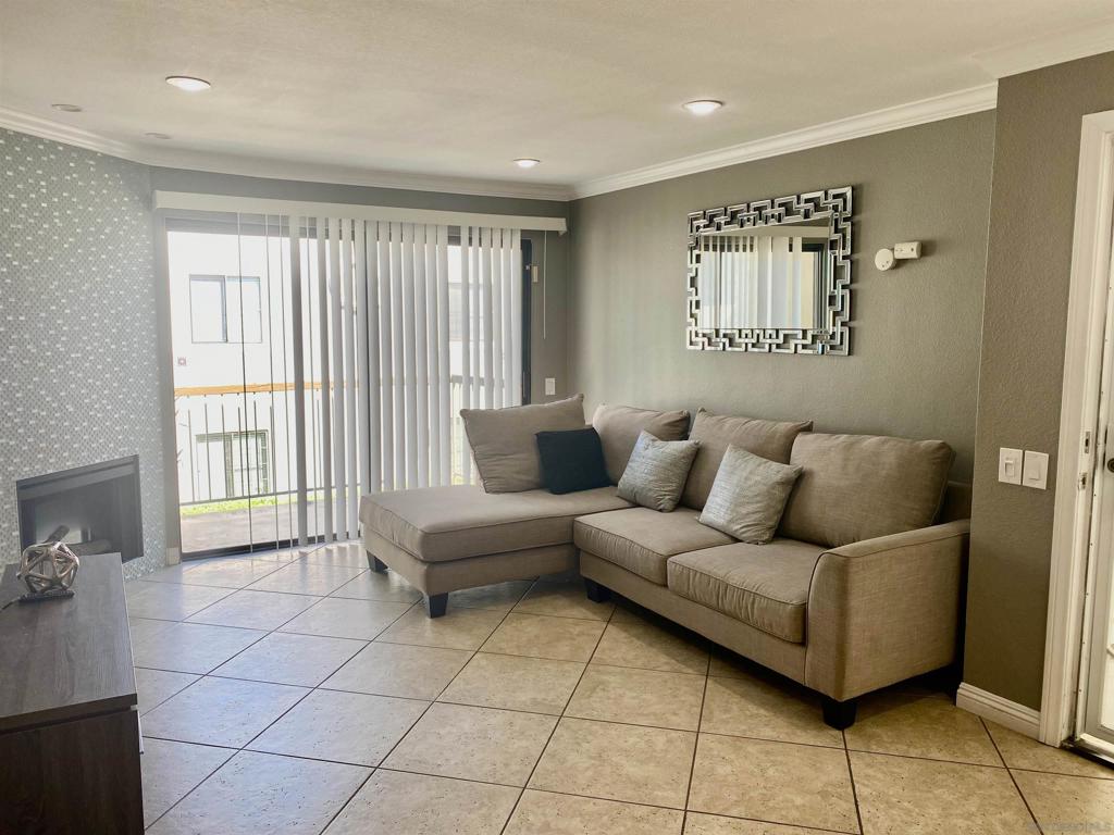 Spacious 2 Bedroom, 2 Bath condominium with 2 assigned parking spaces in the gated community of Sunset Village. Upper unit with no neighbors above, tile flooring in kitchen, living room, dining room, hallway, and bathrooms. Laminate flooring in both bedrooms. Decorative fireplace. Good size balcony off living room with storage closet. Tub/shower in both baths. Great amenities include pool, jacuzzi, and playground area with low HOA. Centrally located with easy access to freeways and close to shopping and schools. Buyer(s) and Buyer’s agent to verify all data, square footage, measurements, records, permits, use zoning, CC&R's, and any and all info pertaining to the property. Complex Features: ,,, Sewer: Sewer Connected Topography: LL