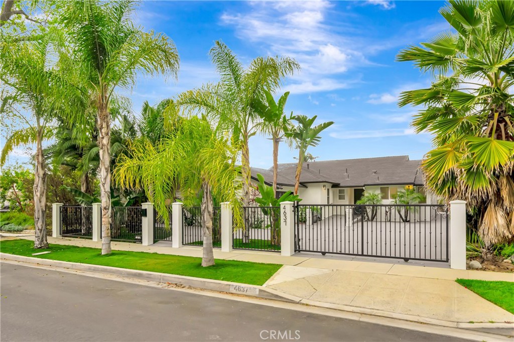 Beautifully remodeled, gated single-family home in the heart of Sherman Oaks! Nestled on a tranquil cul-de-sac, this elegant property offers the perfect combination of modern luxury and serene privacy. Step inside to discover wide plank hardwood floors that flow seamlessly throughout the open-concept living spaces, creating a warm and inviting atmosphere. The spacious living room is perfect for entertaining. A step down family room opens opens to a private yard. The primary suite is a true retreat, offering generous space and a spa-like ambiance. The luxurious primary bathroom features a freestanding soaking tub, dual vanities, and a spacious walk-in shower, creating a serene escape at the end of the day. Both other bathrooms were remodeled with modern designer touches. All bedrooms are well sized. Front bedroom has a separate entrance making it a perfect option for an in-home office or a guest bedroom. Enjoy the outdoor living space in your private backyard, perfect for relaxing or hosting friends and family. The gated entrance ensures privacy and security, making this home feel like a secluded sanctuary while still being conveniently located near the best that Sherman Oaks has to offer. Property is equipped with a back-up generator yo insure that lights always shine bright in this home. Don’t miss out on this exceptional opportunity to own a turn-key home in one of the most sought-after family oriented neighborhoods in Los Angeles.