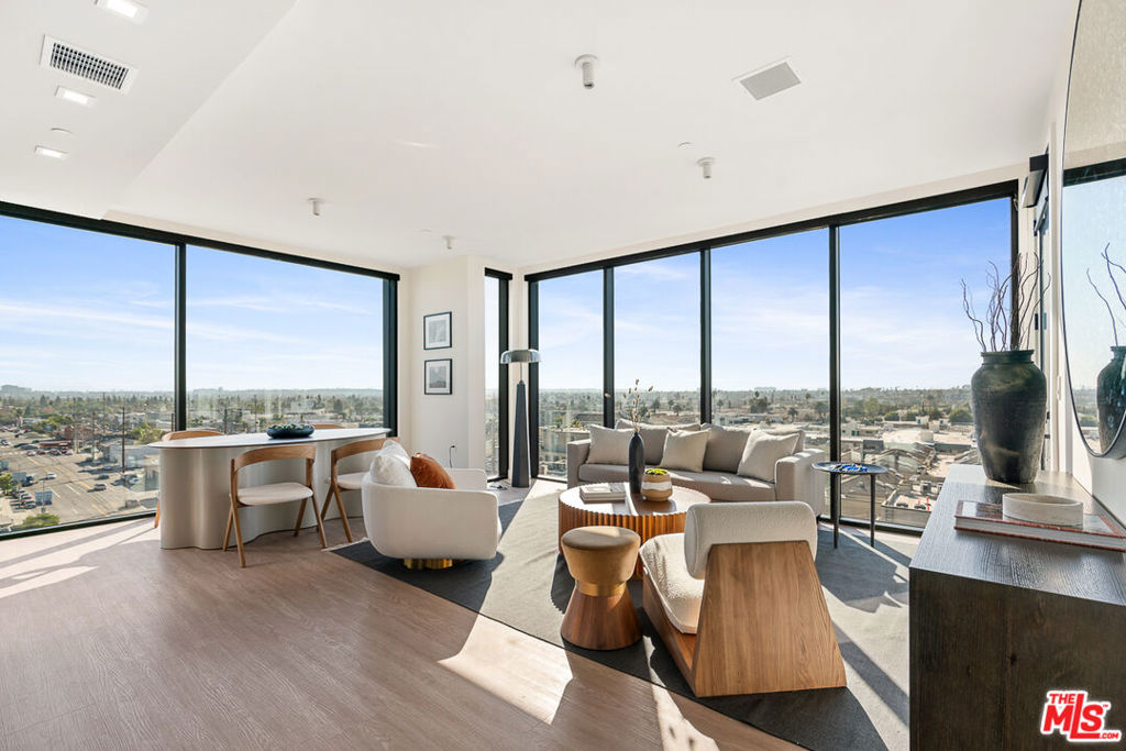 Venue Residences by Helio. This beautiful corner 2 bed + 2 bath is South West facing on the 4th floor, with incredible views of the city. Kitchen has unique dark finishes with stained granite counters, matte black fixtures, and stainless steel Beko appliances. The open living and dining concept allow for a good flow of the space, floor to ceiling windows, as well as access to a large balcony for comfortable outdoor lounging. The spacious bedrooms have custom built-in closets, wall mounted lighting and a remote controlled ceiling fan. Bathrooms have large mirrors, shower/tubs, and under cabinet storage. Residence also includes custom electronic window shades, smart lights, and Nest thermostats. Property amenities include: 2 rooftop lounges, heated dipping pool, fitness center with Technogym equipment, co-work lounges and front desk staff. Parking is $250/month for a tandem space, and internet $84/month. Tours are available by appointment, so please contact us today.