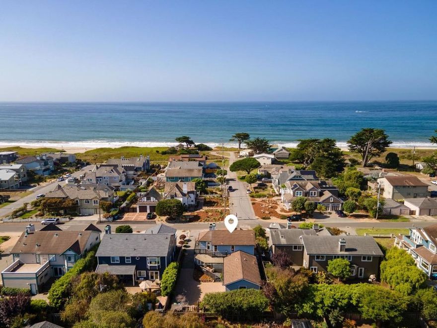 Location, Location, Location! Welcome to 71 Alameda Ave, a one-of-a-kind Coastal Gem on the west side of Miramar in beautiful Half Moon Bay. Just steps from the beach and scenic Coastal Trail, this stunning home offers the ultimate blend of luxury, comfort, and California Coastal Living. Featuring 3 Beds, 3 Full Bathrooms, 2,180 Sqft of living space, on a 6,600 Sqft Lot, built in 1993, updated throughout with modern elegance and Ocean views from multiple rooms and balconies. Step inside to discover a thoughtfully updated interior with, gleaming hardwood floors, recessed lighting, 3 beautifully remodeled bathrooms, a gourmet kitchen with quartz countertops and stainless steel appliances. The primary suite is a true retreat, boasting, a spa-like bathroom with a freestanding tub, ocean views, walk-in closet, fireplace, office enclave, and private balcony overlooking the Pacific. Downstairs features the living room with high ceilings and fireplace, next to the separate dining area, an office/den and 2 bedrooms/ 2 full bathrooms. The long gated driveway with ample parking leads to the finished 2 car garage. Low-maintenance landscaping with turf backyard, flagstone walkways, and paver driveway. Enjoy world-class surfing, kayaking, biking, hiking, and golf, just minutes from your door.