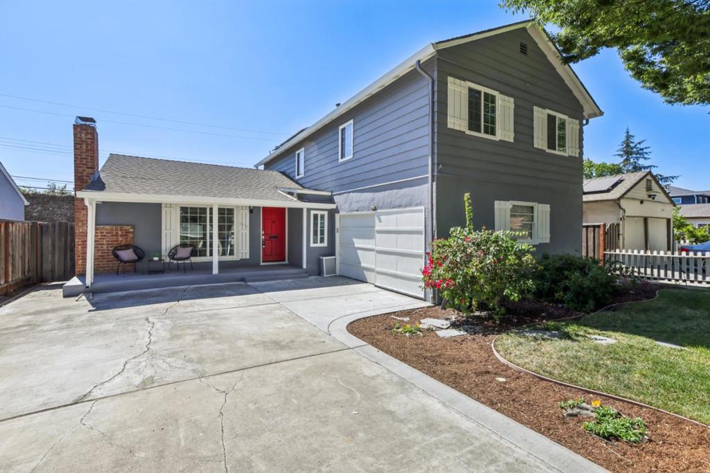 Welcome home to 1413 San Juan Ave, a beautifully updated and energy-efficient 5-bedroom, 2-bathroom home located in the sought-after Rosemary Gardens neighborhood of San Jose. This spacious 1,756 sq ft residence combines classic charm with modern upgrades and thoughtful design across two generous levels. Step inside to find rich walnut hardwood flooring, dual-pane windows, and recessed lighting throughout. The remodeled kitchen features granite countertops, stainless steel appliances, and ample cabinet spaceperfect for home cooks and entertainers alike. The main level offers two versatile bedrooms, ideal for guests or a home office, while three additional bedrooms upstairs provide comfort and privacy. Enjoy year-round comfort with central heating and air conditioning, enhanced by MERV-16 air filtersa major plus during allergy or wildfire seasons. Owned solar panels help keep utility costs low, and the attached garage offers convenience and extra storage. Outside, a private backyard with mature fruit trees (peach and avocado) Located just minutes from San Jose International Airport, downtown, light rail, and major freeways (101, 880, 87), this home is a commuters dream. Enjoy walking distance to Rosemary Gardens Park, and easy access to shopping, dining, and schools.