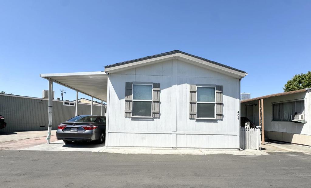 Welcome to this beautiful and move-in ready home in a convenient location. Built in 2015. Well-maintained 2-bedroom, 2-bathroom with 787 sq ft of living space. Home has Double-pane windows for energy efficiency, Laminate flooring, and central AC and Heating for year-round comfort. Livingroom open to the dining area, creating a bright and inviting space perfect for relaxing or entertaining. The separate laundry room includes a washer and dryer for added convenience. Lovingly cared for by its owners, this home is in excellent condition and ready for you to move right in. OPEN HOUSE SUNDAY 07/20/2025 From 12PM-3PM.