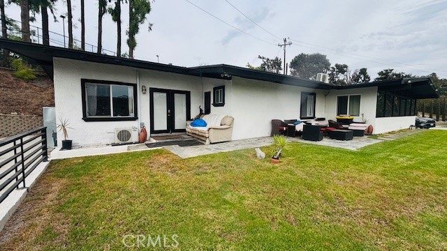 Newly complete Remodeled 2-Bed, 2-Bath Back House for Lease – Move-In Ready! Be the first to live in this beautifully renovated back house, completed in 2024 with brand-new finishes inside and out. This spacious 2-bedroom, 2-bathroom home offers comfort, style, and privacy in a serene hilltop setting. Interior Highlights: Open-concept layout with wood flooring throughout; Bright and airy living space with scenic views—perfect from the dining table or porch sofa; Generously sized bedrooms and bathrooms for easy, relaxed living; Modern kitchen with all-new appliances, including refrigerator and in-unit laundry machines; Cozy yet spacious, ideal for quiet evenings or entertaining guests. Exterior & Amenities: Private gated entry with remote access for added security; One shared wall with the front house for enhanced privacy; Expansive front yard parking; Peaceful location atop a small hill with fresh air and lovely views. Lower rent includes water, gas, and trash collection. Tenants only pay for electricity and internet. It is a huge lot with three units in total and three tenants households. This home offers the perfect blend of comfort and convenience—whether you're sipping coffee on the porch or enjoying the view from your living room. Come experience a fresh start in a space that feels truly yours.