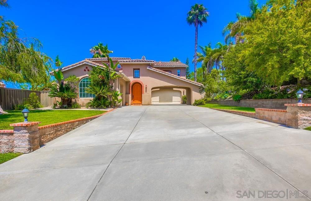 Spacious and very private executive home, backing up to open space and walking trails. This home offers 5+ bedrooms, one downstairs for extended family and one additional that can be used for guests or a formal office. 4 bedrooms upstairs, master bedroom has backyard views to the mountains and canyon. It has his and hers vanities as well as a huge walk in closet. Two other bedrooms share one bathroom and another has its ensuite bath. Laundry upstairs with sink and even a built in desk for homework or work station. Bright, private and serene, walk out to a large backyard, with mature fruit trees, grassy area, built in fire pit and BBQ. This is an entertainers dream. Minutes from beautiful and sunny beaches of Southern California. From large covered patio listen to the birds and enjoy unobstructed views of the canyon and nearby hills. The canyon funnels ocean breeze and marine layer which offers salubrious micro-climate. kitchen has granite counter tops; large family room with fireplace. Five minutes' walk to the Rancho Carrillo association swimming pool and community facilities. Walking trail takes you to nature and enjoy the wild life. to the Rancho Carrillo association swimming pool and community facilities. Walking trail takes you to nature and enjoy the wild life.