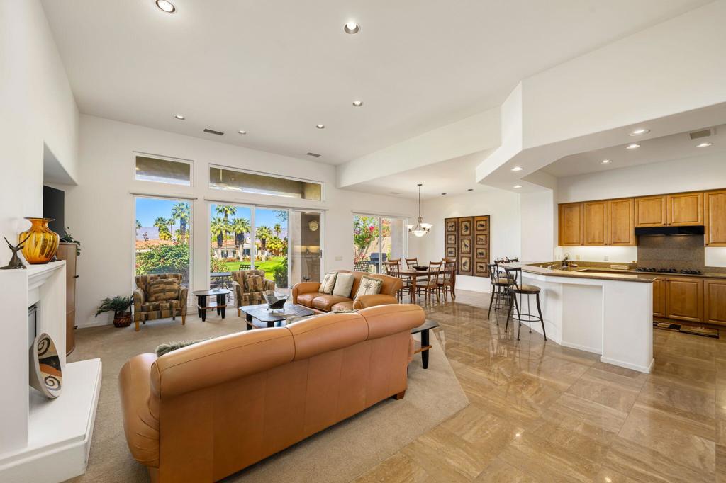 Golf Membership available to Buyer! Owned Solar! This Bougainvillea 1 model is located on Arroyo #9 at Indian Ridge CC. Very private, with expansive mountain, course and lake views. First time on the resale market! This immaculate home is offered furnished and features an open floor plan that is very popular and great for entertaining. Electric window shades in living/dining rooms and bedrooms! Wet bar has been removed, making the great room more spacious. Kitchen has countertop seating with an adjacent dining room. The Master Bedroom is en suite with slider doors to the patio area and offers the same private views. The 2 private guest rooms are also en suite. Two car garage is attached and also features a golf cart garage. Indian Ridge CC features two Arnold Palmer Signature golf courses, tennis & pickleball facilities, fitness center, full-service day spa, two restaurants, 38 community pools/spas, & active social calendar. Come join the fun!