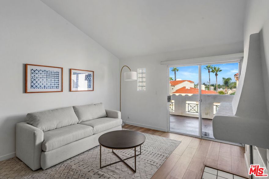 Welcome to resort-style living in this top-floor unit at Pacific Terrace. Located in Building B, the furthest from Torrance Boulevard, offering enhanced peace and privacy. This bright and sunny condo boasts nearly 1,300 square feet of thoughtfully designed living space, including dramatic vaulted ceilings, three spacious bedrooms, and two full bathrooms. The kitchen features new quartz countertops, a stylish faucet, and a farmhouse sink, all opening seamlessly to an inviting living room with soaring ceilings and a cozy fireplace. Transition outside to a large private balcony overlooking the pool and courtyard, perfect for entertaining or simply relaxing. Additional highlights include new laminate-wood flooring throughout the living areas and the convenience of in-unit laundry with a dedicated washer and dryer closet. Pacific Terrace offers exceptional amenities, such as a pool, spa, sauna, exercise rooms, and a clubhouse. HOA fees cover basic cable, internet, and earthquake insurance.