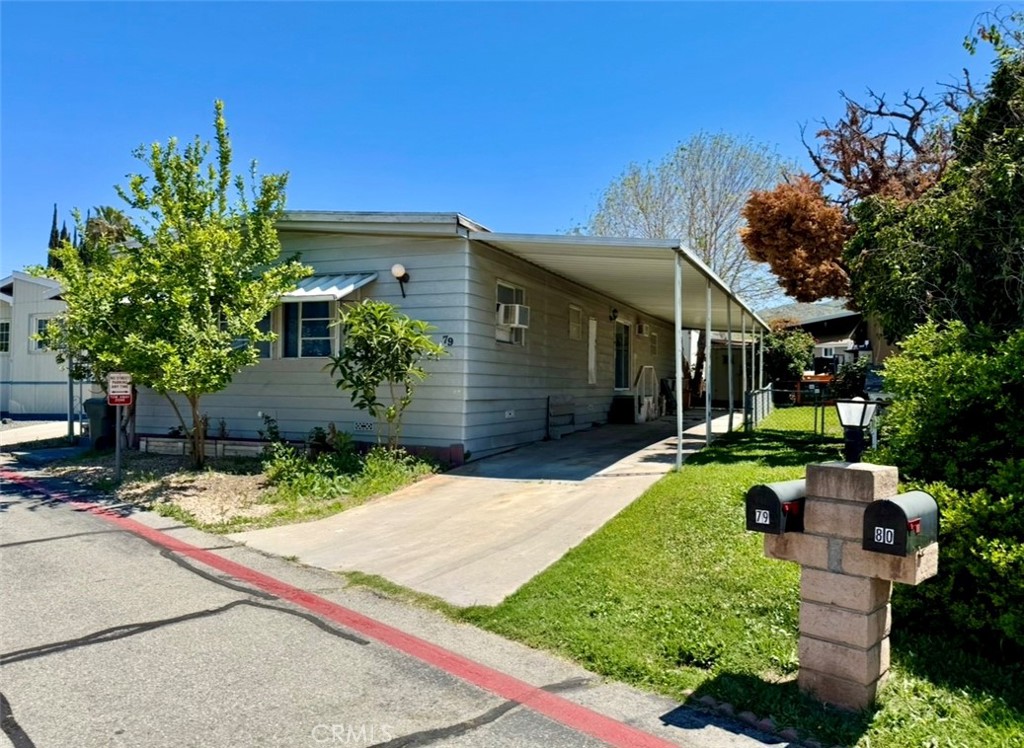 Welcome to this beautifully maintained 3-bedroom, 2-bath manufactured home located in a friendly, well-managed all-age mobile home community in Grand Terrace!
This spacious home offers brand new laminate flooring, fresh interior paint, and updated lighting in the living room. The bright and open living area flows seamlessly to a covered patio—perfect for relaxing or entertaining. A covered carport adds convenient parking.
Community amenities include a large clubhouse ideal for gatherings, a sparkling swimming pool, soothing spa and jacuzzi, a playground, and available RV parking.
Located in the heart of Grand Terrace—recognized as a “Blue Zone” known for health and longevity—this home is close to major freeways and local shopping.
Don’t miss this opportunity to own a comfortable, affordable home in a highly desirable location!