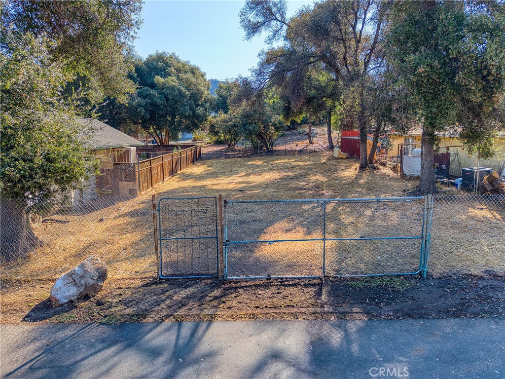 **Prime Building Opportunity in Clearlake**
This vacant residential lot at 3100 13th St offers an excellent opportunity to build your dream home in a well-established Clearlake neighborhood. The property comes fully fenced and ready for construction, with all utilities conveniently available at the street level.
Zoned R1 for single-family residential use, this lot provides the perfect foundation for your custom home project. The infrastructure is already in place, making the building process more straightforward and cost-effective.
The location puts you in the heart of Clearlake's residential community, where you'll enjoy easy access to local amenities. Austin Park is nearby for outdoor recreation and family activities. Daily shopping is convenient with Super Chavez Market just a short drive away for groceries and essentials. Public transportation is accessible via the Highway 20 and Lakeland Street bus station.
This neighborhood offers a relaxed small-town atmosphere while keeping you connected to necessary services and amenities. The area is known for its quiet residential streets and friendly community feel.
Whether you're looking to build your forever home or considering this as an investment opportunity, this lot provides excellent value in today's market. The combination of available utilities, fenced perimeter, and R1 zoning eliminates many of the initial hurdles typically associated with new construction projects.
Don't miss this chance to secure a building-ready lot in an established Clearlake neighborhood where you can create exactly the home you envision.