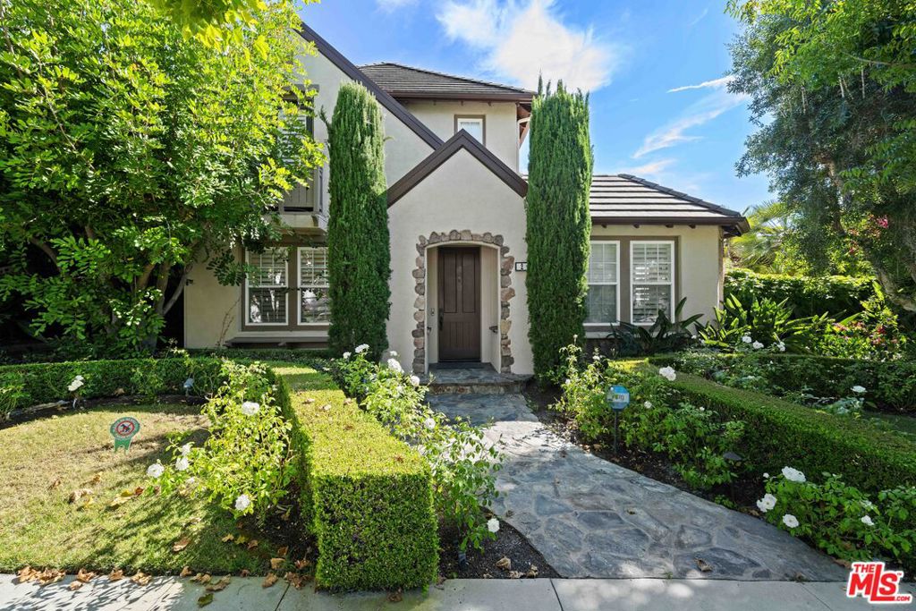 A one-of-a-kind, remodeled pool residence with a modern farmhouse and luxurious new finishes throughout. Located on a premium interior corner lot on a quaint cul-de-sac in the Oak Knoll Village, this home features five bedrooms, including a main floor bedroom, plus an office and separate casita/exercise room. This unique and functional floor plan features carefully selected interior details, including luxury laminate wood flooring, designer paint, custom lighting, Solar Panels (FULLY paid), soft water, a water filtration system, EV charging connections, and French doors to loggia/pool area from the guest room, breakfast nook, dining room, and office. The impressive kitchen opens to the family room. It features new high-quality natural quartzite counters, a ship-lapped island, a designer backsplash, a single-basin extra deep sink, custom fixtures, and a generous pantry at the breakfast nook. On the second floor is an elegant primary suite with a French door and Juliet balcony overlooking the pool, a stunning master bath with dual sinks and quartzite counters, a custom fixture, a freestanding tub, and a custom shower with tile/stone detail, frameless shower door, and two walk-in closets with custom cabinetry. Enjoy the peace and serenity of this private lot, featuring a sparkling, heated pool with a Pebble Tec finish, a covered loggia, and lush landscaping. Close to community parks, the Oak Knoll Clubhouse has pools and sports facilities.