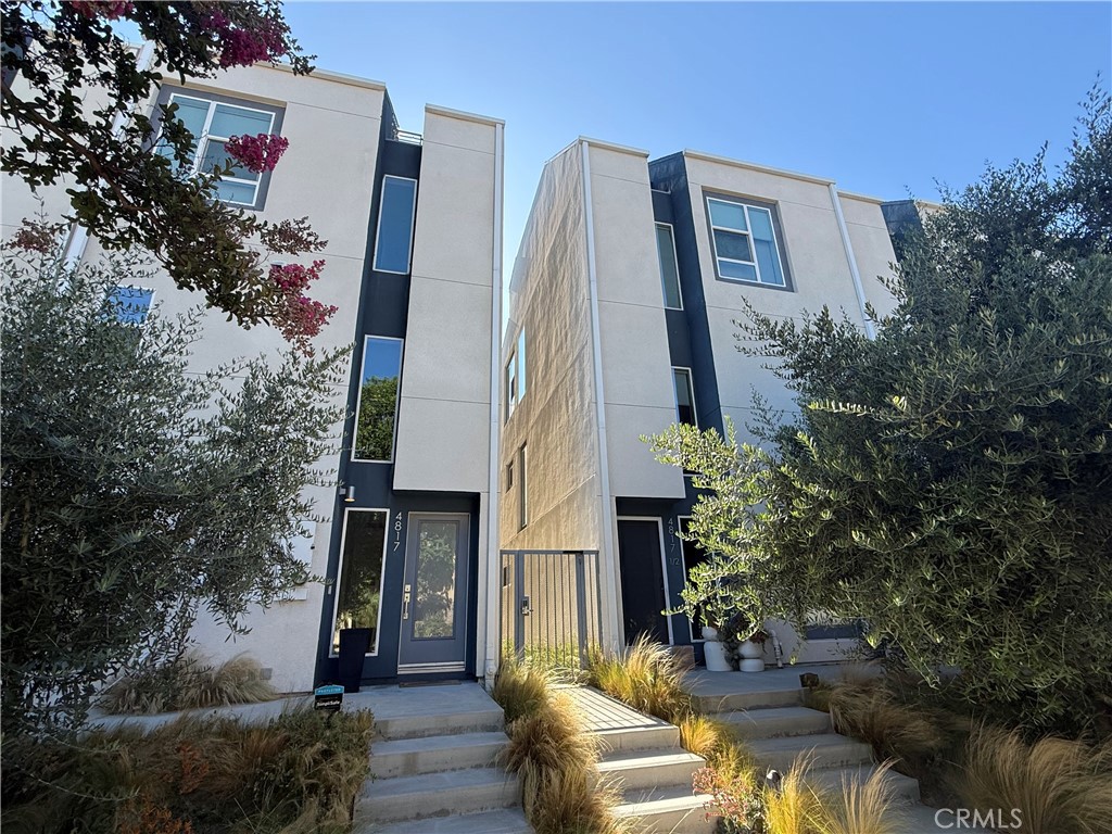 Live your best life at Blu, a 2019 newly built Modern community, offering tri-level homes in North Hollywood. Unit 4831 is an exceptionally well-kept home featuring: freshly painted interiors, 3 spacious bedrooms, 4 bathrooms, 1562 sq ft of naturally lit interior space with a beautiful rooftop deck with panoramic city views. Location, Location, Location, this contemporary home is centrally located in Los Angeles County mins from: Noho Arts District, 4 mins to Toluca Lake, 8 mins from DT NOHO, 9 mins to Studio City (Universal Studios Hollywood), 11 mins to Burbank Airport and 30 mins to DTLA or WEHO. Noho is known for their growing food scene, nearby craft cocktails and beer spots, trendy bars, shopping, coffee shops, access to organic and vegan grocery stores, fitness studios & gyms and an exciting nightlife. Built in 2019, this sophisticated home doesn’t fall short with clean lines, on-trend style and functionality. With an attached 2-car garage with EV charging, this home is made for a person who is always on the go. Don’t have time to park in the garage? An extra parking spot in front of the garage comes in handy especially with the hustle and bustle of LA. Overworked? I’ve got the remedy! Enjoy a glass of your favorite drink while taking in some relaxing LA views on the rooftop deck, do a sunset yoga session or meditate. This rooftop is perfect for a BBQ, light reading, getting a little sun or enjoying quality time under the LA stars; right in front of a flickering stone fireplace. Feeling a little chilly after sunset? Well, come on in where you enjoy the warmth of a newly installed HVAC system (2024). This home is so versatile; as it is great for single young professionals who like their space, newly married couples or a family with a couple of children! The modern kitchen is equipped with a newer oven/stovetop, Stainless Steel appliances including a: GE 3-door fridge with Keurig (coffee maker) attachment, 5-burner stove, dishwasher, front loading Washer & Dryer, 4 bathrooms, touch-activated mirrors and so much more… Consider this luxurious home as your blank canvas ready to take shape as you showcase your creative style and highlight personal touch. Other amenities include: gated entry, convenient in-unit laundry, storage space on the rooftop and in the garage. All things that offer more safety, convenience and cleanliness. This home looks even better in person! You’ve got to see for yourself! Book your showings today!