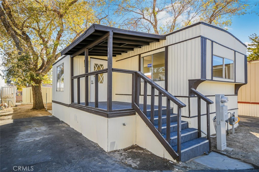 This fully renovated mobile home is priced to sell. Enjoy a fresh look inside and out, with brand new exterior and interior paint, carpet, and flooring throughout. The beautiful new kitchen features quartz countertops, modern cabinets, stainless steel appliances, and even a breakfast bar. Other highlights include a spacious dining room, a laundry area, a covered front porch, and a large storage shed out back. You'll also love the convenience of being close to shopping, restaurants, and more.