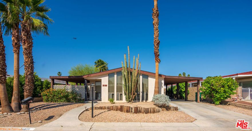 Live the Dream in Portola Country Club. Welcome to Portola Country Club, a beautifully maintained 55+ gated community in the heart of Palm Desert, where you own the land and enjoy unlimited golf for two on the private 18-hole par 3 course all included in the low $440/month HOA fee. This spacious and beautifully kept 2-bedroom, 2-bath home offers parking for four cars. Inside, you'll find a spacious living and dining area, open layout perfect for entertaining. The living room features soaring ceilings, and the large family room opens to a private covered patio and enclosed yard, ideal for pets or peaceful outdoor living. The primary suite boasts a large walk in closet, large bathroom with a walk-in shower. The second bedroom has its own private bath with a tub/shower combo. An additional flex room with separate A/C offers space for an office, craft room, gym, or whatever your heart desires.This home is on a 433A permanent foundation, making it eligible for traditional financing. Enjoy mountain views and a vibrant community atmosphere. The HOA covers not just golf, but also access to the clubhouse, fitness room, pickleball, tennis, bocce ball, multiple pools and spas, RV parking, plus cable, internet, and trash services. With just 500 homes, Portola Country Club is a friendly and active community just minutes from El Paseo's shopping, dining, and Eisenhower Medical Center. Don't miss this opportunity to live in one of Palm Desert's best-kept secrets.