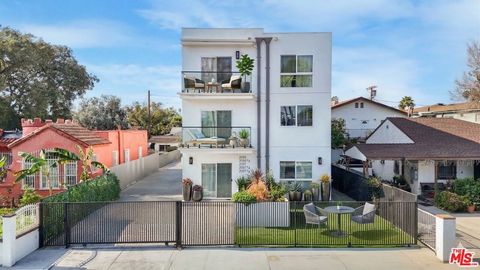 Photo of 2057 S Garth Avenue, Los Angeles, CA 90034 (MLS # 26673745)