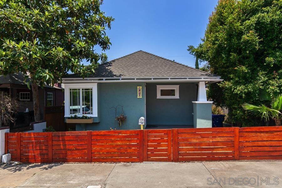 Nestled on a quiet, low-traffic street in the heart of Golden Hill, this 3-bedroom, 2-bath 1908 bungalow blends timeless charm with comfortable living including a fully paid Solar System providing huge savings. Inside, you're greeted by a spacious living and dining room combination featuring beautiful period molding, trim, and rich architectural details. Natural light pours in through the Andersen windows (see supl) including elegant French-style windows that frame a custom-built corner window bench, perfect for cozy mornings or afternoon reading. The kitchen offers ample cabinetry and counter spacemaking it ideal for both everyday use and entertaining. The master bedroom opens to the backyard through elegant French doors, where mature citrus trees, a small grassy area, and drought-tolerant landscaping offer a private outdoor retreat. A shaded wood pergola patio is the perfect spot to enjoy San Diego's beautiful weather. To the right of the yard, a raised area offers potential for a garden, outdoor lounge, or play space, limited only by your imagination. A large detached two-car garage would make a great ADU for guests or to generate additional income.. This home is perfectly situated blocks away from local favorites, including a wine bar, craft beer bar, yoga studio, after-hours spa, and salon. Golden Hill's vibrant neighborhood also offers access to a community rec center, a popular weekly Farmer's Market, Balboa Park Golf Course, and several local dining spots. Known for its historic charm and architectural variety, Golden Hill offers incredible proximity to freeways, Coronado's world-class beaches, and the excitement of Downtown and Balboa Park- all just minutes from your doorstep.