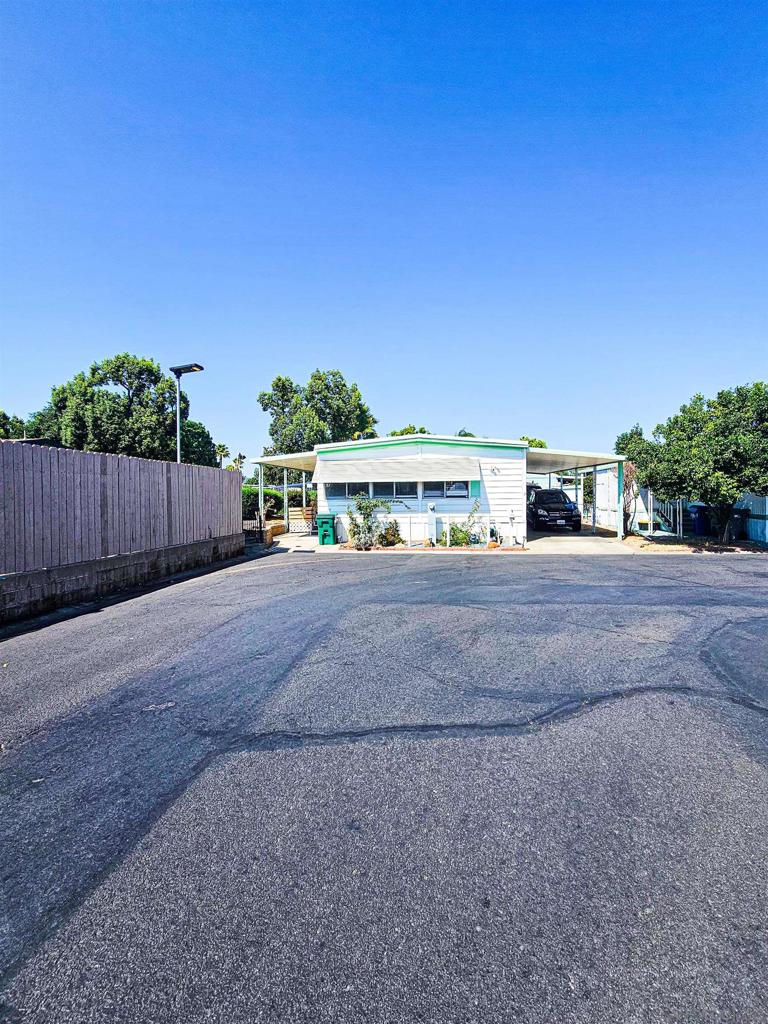 Welcome to Greenfield Mobile Home Estates, an all-ages community in the heart of El Cajon! This spacious 1973 manufactured home has been thoughtfully modified into a 3-bedroom, 2-bath open-concept layout offering approximately 1,344 sq. ft. of living space. The home features a bright and airy floor plan with flexible living and dining areas, perfect for modern lifestyles. Situated in a well-maintained community, residents enjoy access to amenities including a clubhouse, swimming pool, recreational facilities, and laundry center. Conveniently located near schools, shopping, parks, and freeway access, this home combines comfort, value, and convenience. With low property taxes and a pet-friendly policy (with restrictions), Greenfield Mobile Home Estates is an excellent choice for families, first-time buyers, or anyone looking for affordable homeownership in San Diego County.
