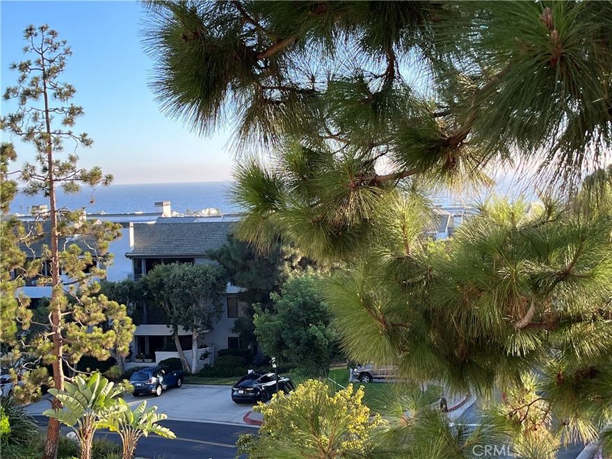Located in "Versailles on the Bluffs at Newport”. Enjoy a desirable resort-like lifestyle from this ocean view top-floor unit in a lovely gated community, ideally situated just four blocks to the beach and just east of Pacific Coast Highway. The 2 bedroom suites are on opposite sides of the living room. The gated community has access codes required to enter both grounds and building for added security. Enjoy all the fabulous amenities the Versailles community has to offer: Beautiful pool, spa, sauna, exercise rooms, BBQ’s and a clubhouse with kitchen for socializing with guests. Located conveniently close to Hoag Hospital, Balboa Island, Lido Island, Fashion Island, theaters, restaurants and shopping and the most beautiful beaches in Southern CA. Other amenities include storage cabinet in garage, on floor trash chutes, bike cage in garage, and onsite laundry. Water & trash are included.  Sale is subject to an existing lease ending 1/31/2026.