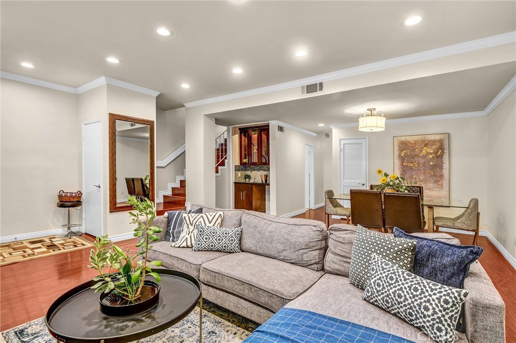 Welcome to this beautifully upgraded 4 bedroom, 2.5 bathroom condo nestled in a gated, quiet, garden style community in the heart of Arcadia. With tasteful craftsmanship throughout, this home offers both luxury and comfort in a highly desirable location.
The custom kitchen and wet bar feature solid cherry wood cabinetry, perfectly complemented by richly toned flooring that flows throughout the unit. The custom cabinets in the bathrooms are the same style in white enhancing the continuity of the craftsmanship. Granite countertops in the kitchen and elegant marble in the master bathroom elevate the home’s overall quality, while hand-selected glass tile backsplashes in the kitchen, wet bar, and bathrooms add a refined, modern flair.
Upgraded tile flooring in the kitchen, bathrooms, and entryways is both durable and stylish. Recessed lighting in the kitchen, living room, and master bedroom offers a contemporary touch. Natural light fills the space through two skylights located in the upstairs hallway and master bathroom, and north-facing windows in the upstairs bedrooms and downstairs added bedroom provide tranquil mountain views.
Additional features include a community pool, ample storage options including attic space, garage storage, and a private shed in the patio area. Enjoy peace and serenity in this beautifully maintained complex, surrounded by lush landscaping and a serene garden oasis.
Walking distance to Arcadia High, Holly Ave Elementary School, Arcadia Library, Santa Anita Mall, restaurants, shops and supermarket.
Don’t miss this rare opportunity to own a thoughtfully upgraded home in a prime Arcadia location!