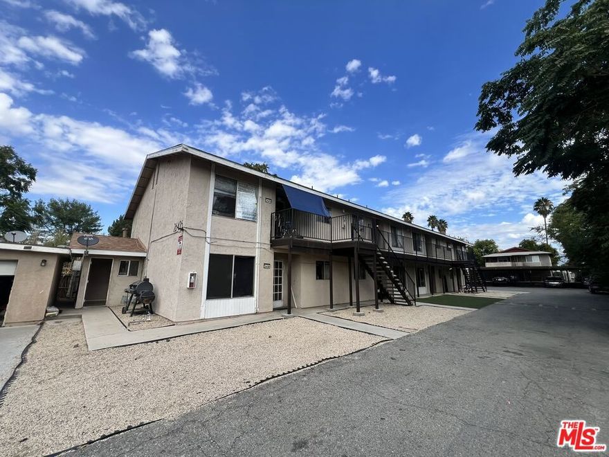 Move-in ready 2-bedroom, 1-bath end unit upstairs apartment located on the quieter south side of Hemet! Step inside this cozy 900 sq. ft. end unit with open and bright living room.. The kitchen boasts granite countertops and comes equipped with a stove and refrigerator, making meal prep a breeze. Enjoy the convenience of central AC and heat, plus an onsite laundry room in this gated, family-friendly complex of just 9 units offering a sense of community without the hustle and bustle of a large property. Located near schools, a hospital, and shopping, you'll have everything you need close by. Tenants are responsible for electricity and gas, while the landlord covers water. Don't miss your chance to call this charming apartment home! Call to schedule a viewing or for additional details. No pets One year lease min.
