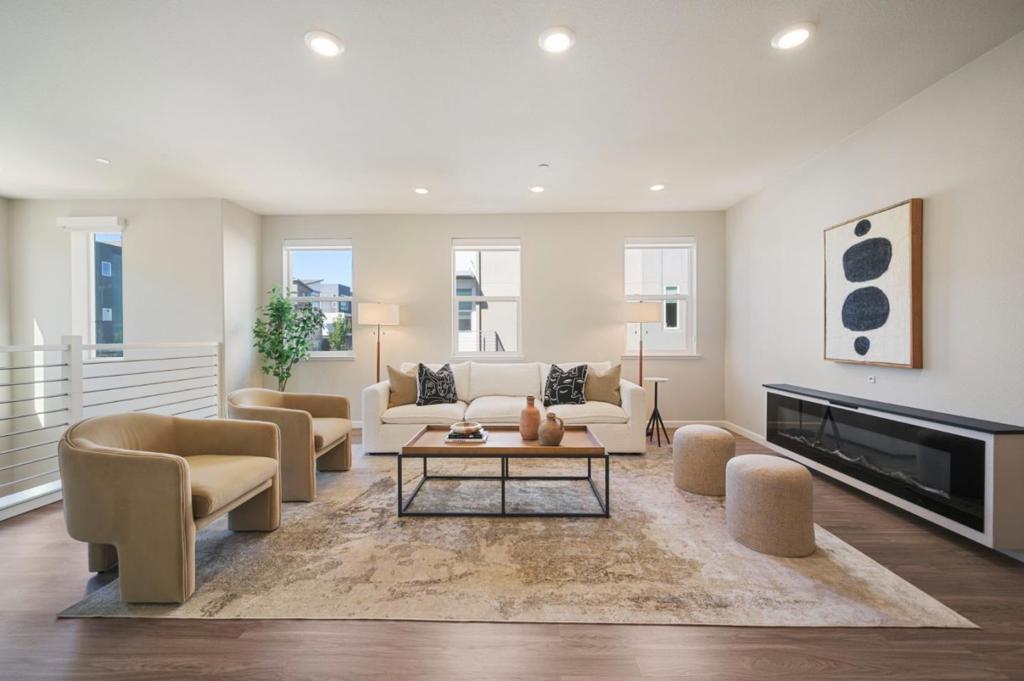 Welcome to your dream home in Communications Hills coveted Metro Phase 2! This first-time-on-market 3-bed/3-bath contemporary end-unit showcases one of the most desirable floor plans in the community, blending modern elegance and functional design with abundant natural light and exceptional privacy. Uniquely positioned, it offers rare dual views of both the East Foothills and Mt Umunhum, plus an oversized shared driveway an exclusive feature of this location. The ground floor includes a private bedroom and full bath ideal for guests or home office while upstairs a bright open-concept living and dining area opens to a generous private balcony with sweeping hillside views. The gourmet kitchen features stainless steel appliances, a gas cooktop, generous pantry and ample counter space, perfect for everyday meals or entertaining. The luxurious primary suite boasts a walk-in closet, dual-sink vanity and spacious shower, complemented by another well-appointed guest bedroom and full bath. Additional highlights include a side-by-side 2-car garage with epoxy floors, tankless water heater and energy-efficient features. Enjoy scenic walking trails, the iconic Staircase and vibrant community atmosphere, all just minutes from downtown Willow Glen with easy access to Highways 87, 280 and 101.