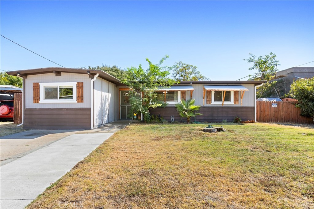 Adorable, remodeled 3-bedroom home with additional bonus room in South Oroville. Open concept kitchen and family room with slider access to backyard patio. Large, treed backyard with beautiful views of the foothills! Newer mini-split HVAC, RV/Boat parking, easy access to parks and trails, close to everything. Would make a perfect starter home or downsize opportunity!