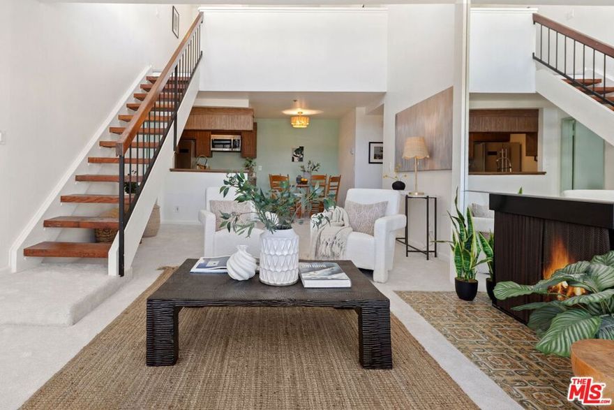 Two-story penthouse with a private ocean-view deck, set along the Esplanade, Redondo Beach's most coveted stretch of coastline. A front-row seat to the ocean air and the quiet luxury of life at the water's edge. This rare three-bedroom, two-bath top-floor residence combines function with a timeless coastal aesthetic. The building's special assessment has already been paid in full, ensuring peace of mind for the next owner. Easily reached by the building's elevator from either the lobby or upper garage, the home includes two side-by-side parking spaces and an in-unit laundry closet with full-size machines. Both lower bedrooms feature en-suite baths, ideal for privacy and guests. The primary suite opens to a second balcony and offers two closets, including a generous walk-in. The guest bedroom includes a versatile bonus loft, while the upper third bedroom features a large closet and direct access to the private ocean-view deck, a true sanctuary of light, air, and tranquility. There's an atmosphere to this home that defies description; it has to be experienced to be understood.