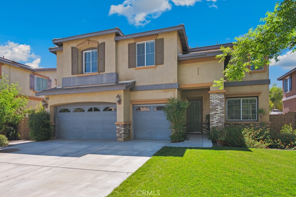 Luxurious and spacious, this 5-bedroom, 3-bath home is ideally located in the highly desirable Rosetta Canyon community—just minutes from shopping, dining, and I-15 for convenient commuting. Enter inside to soaring 11-foot ceilings, rich wood flooring, and an oversized granite island kitchen featuring upgraded cabinetry and a seamless flow into the open-concept family room—perfect for everyday living and entertaining. The first floor is designed to be wheelchair accessible, featuring a level entry, plus a large downstairs bedroom, and a full bath with a walk-in shower—ideal for guests or multigenerational living. Upstairs, retreat to an expansive primary suite with a spa-like en-suite bath, while generously sized secondary bedrooms offer ample space and natural light. The large backyard with stamped concrete is ready for outdoor enjoyment, and a 3-car garage provides plenty of storage. Located near Earl Warren Elementary, Elsinore Middle school and Temescal Canyon high school, and surrounded by resort-style community amenities including parks, athletic fields, tennis and basketball courts, BBQ areas, a dog park, and a scenic lake—this home truly has it all.