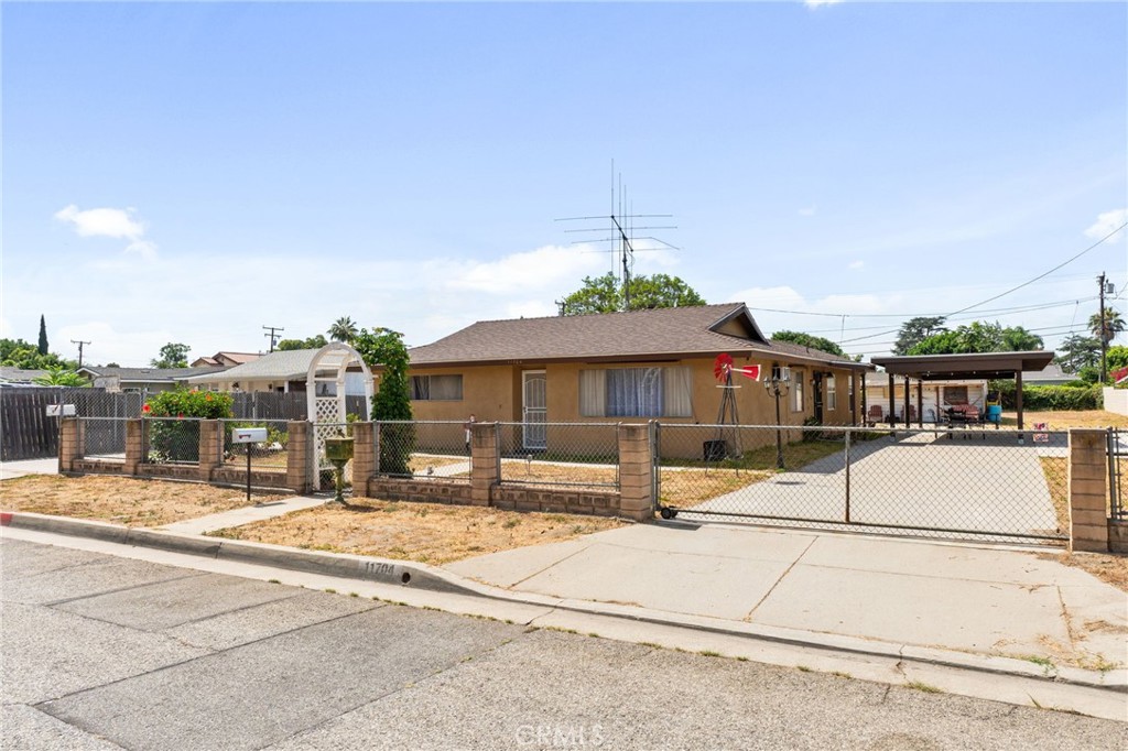 Charming North El Monte Home on Expansive Lot with Endless Possibilities! Welcome to this well-maintained 2-bedroom, 2-bath home featuring a versatile bonus room with a closet—perfect for use as a third bedroom, home office, or guest space. Situated on a generously sized lot, the property offers ample space for RV parking, outdoor entertaining, or the potential addition of an ADU (Accessory Dwelling Unit). Recent upgrades include a newer roof, carport, and driveway completed in 2022, providing both peace of mind and added value. Inside, you'll find durable ceramic tile flooring throughout, making maintenance a breeze and lending a clean, cohesive look to the interior. Located in a quiet, established neighborhood in desirable North El Monte, this property offers both flexibility and opportunity—ideal for a first time buyer. Don’t miss this chance to own a home with room to grow and customize to your needs! Schedule your private tour today!