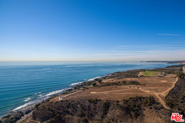 Extraordinary opportunity to own and develop the most legendary knoll boasting apx 24 acres above Malibu Colony. Coastal development permits have been obtained to create a 5 home guard gated compound with 360 degrees of the most spectacular white water, coastline, island, mountain and city light views. The individual high estates range from 9,500 to 11,500 with 1,000 sf basements designed by the world famous. The lots range from 2.45 to 5.78 acres with large flat areas and spectacular views.