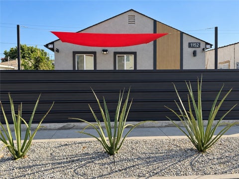 Photo of 1152 E 77th, Los Angeles, CA 90001 (MLS # SB26205414)