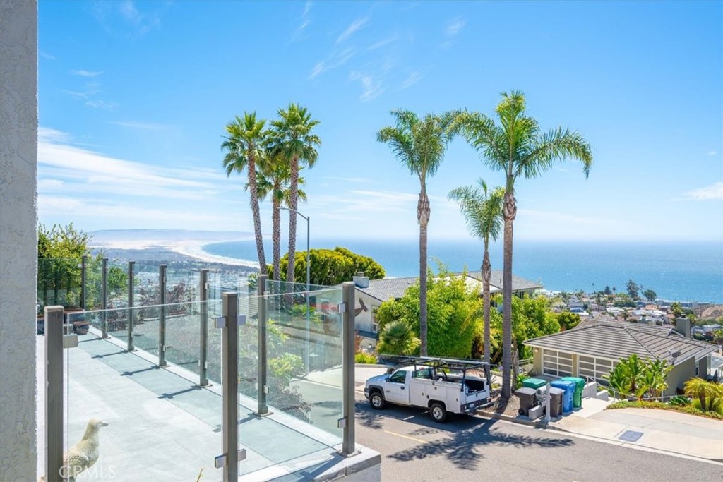 Stunning Ocean-View Home in Pismo Heights – Your Dream Coastal Retreat
Nestled atop the serene Pismo Heights, this captivating 3-bedroom, 2-bathroom home offers the ultimate blend of luxury, comfort, and breathtaking views. From nearly every room, enjoy panoramic vistas stretching from Point Sal to Shell Beach, where the horizon meets the endless blue of the Pacific.
Key Features Include:
Spectacular Ocean Views: Sweeping coastal panoramas from virtually every room.
Open-Concept Living: A spacious, flowing floorplan with soaring vaulted ceilings and an abundance of natural light and fireplace
Expansive Viewing Deck: Enjoy ocean sunsets and starry nights from your private deck with glass sides.
Gourmet Kitchen: Equipped with sleek Corian countertops, ideal for preparing your favorite meals while enjoying ocean views, center island, newer appliances, walk-in pantry and ample cabinets
Bonus Room & Atrium: A newly renovated atrium brightens the bonus room, and the swim spa offers a perfect way to unwind while soaking in the natural light.
Attached 2-Car Garage: Extra space for vehicles and storage.
Just minutes from the iconic Pismo Beach Pier, this home is perfectly positioned to enjoy the best of coastal living. Stroll to shopping, dining, bike paths, beach and even horseback riding along the beach. A nearby park located on the Heights bluff adds a layer of tranquility, while this community is renowned for its spectacular sunsets that will leave you in awe.
Don't Miss Out!
This exceptional property offers a rare opportunity to own a piece of paradise in one of the Central Coast’s most sought-after locations. Schedule your private tour today and discover why this is more than just a home – it’s a lifestyle.
Furnishings Available: The beautiful furnishings in the home can be included and are negotiable, offering the opportunity to move in and start enjoying your new life by the beach immediately.