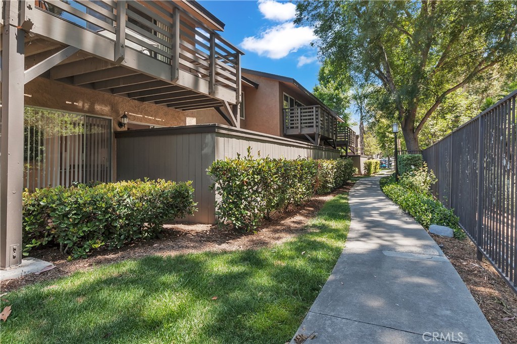 Welcome to 1480 W. Lambert Rd Unit 289 — a beautifully updated 1-bedroom, 1-bath condo in the serene, gated Creekside Village community of La Habra. This move-in-ready home features stylish granite countertops in both the kitchen and bathroom, vinyl wood flooring throughout, and tile in the kitchen and bath for added durability. The spacious bedroom offers a walk-in closet, while the bright living area opens to a private patio and yard complete with low-maintenance artificial turf — ideal for relaxing or entertaining. The kitchen comes fully equipped with a stove, refrigerator, and dishwasher.
Perfectly positioned within the community, this unit is just steps away from the tranquil creek, BBQ area, sparkling pool, and on-site laundry facilities. Enjoy the unbeatable convenience of nearby shopping and dining along Beach Blvd and Imperial Hwy — everything you need is just minutes away. Whether you're a first-time buyer or looking to downsize, this home offers comfort, convenience, and style in a location you’ll love.