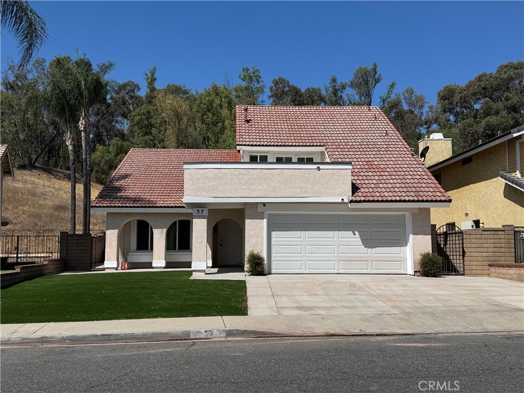 Beautiful, two stories 4 bedrooms / 2.5 baths / 2 cars direct access garage house located in Pomona; Bright & airy floor plan; NEW vinyl flooring on stairs and upstairs; NEW kitchen cabinets and counters; Fireplace in the family room; Wet bar; Quiet neighborhood.