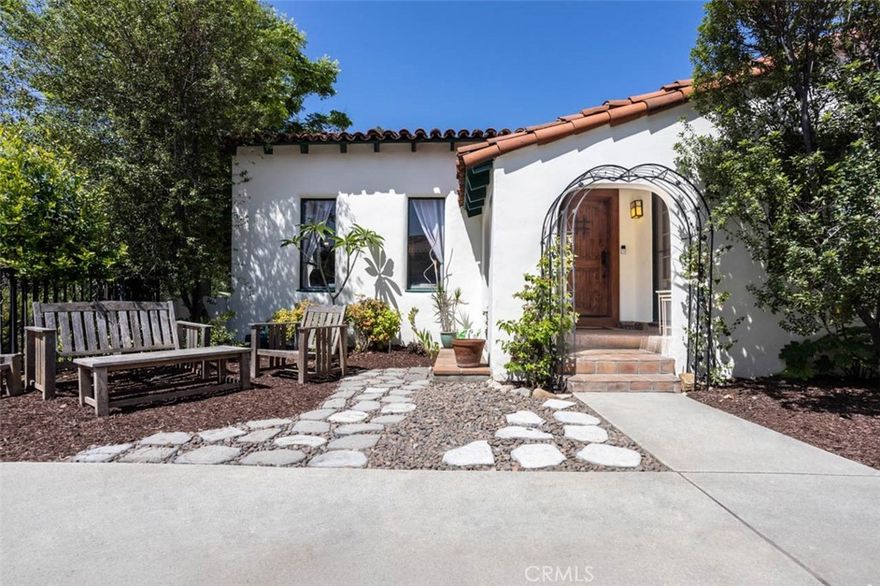 This beautiful, spacious 1928 Spanish home in the lower Rossmoyne area features many original elements and is on the market for the first time in 30 years. As you enter the home through the inviting courtyard, you will see an impressive large living room with original coffered ceilings and an exquisitely sculpted fireplace. The living room has original hardwood flooring that extends throughout the house. The oversized formal dining room flows from the living room through a traditional Spanish archway and mirrors the same beautiful, coffered ceilings. Off the dining room is a breakfast room which opens to the kitchen though another archway. The kitchen has been recently updated with new appliances and countertops and features glass panel doors on the upper cabinets. The laundry room, conveniently located off the kitchen, exits to the back yard. The large primary suite has a 3/4 bath, a large closet and an attached space that has been used as an office, nursery, exercise room and reading room, which also exits to the back yard. The additional two large bedrooms have plenty of closet space. Private dog friendly backyard and patio. This house features newly installed solar power with backup battery, an EV charger and has been earthquake bolted and retrofitted. The components in this home have been well maintained by the current owners. House measures larger than assessor records, at 2025 sq. ft. per REST. Located near some of Glendale's and Eagle Rock's best dining and shopping, including The Americana, Whole Foods, Erewhon (coming soon), TraderJoe's and more. This home also offers convenient access to downtown Los Angeles, the 134, 2 and 5 freeways and is close to local schools and parks. Don't miss seeing this striking property in one of Glendale's most desirable neighborhoods, making it your home to enjoy!