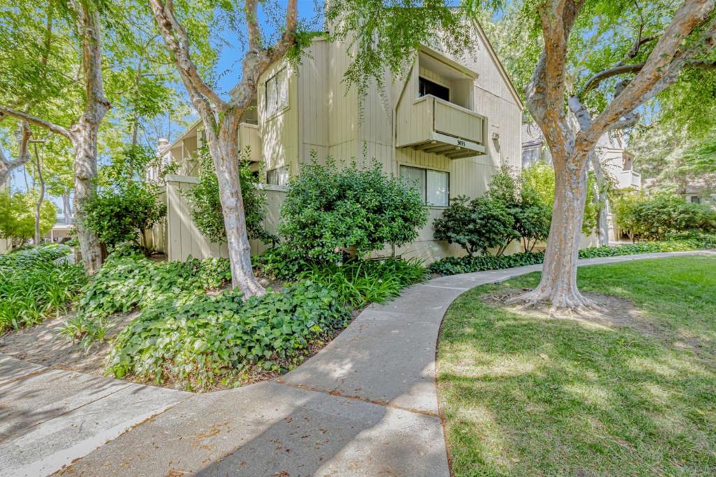 Beautifully updated second-floor condo in the heart of Santa Clara! This 1BR/1BA home in the desirable Woodsborough community features a remodeled kitchen with granite countertops and breakfast bar, spacious living/dining area, recessed lighting, and tiled entry. Enjoy two private balconies with serene views of lush landscaping and peaceful community ponds. The large bedroom includes a walk-in closet and ceiling fan for added comfort. HOA covers hot water, garbage, roof, security patrol, pools, ponds, rec rooms, and moreproviding easy, low-maintenance living. Walk to Central Park, Safeway, restaurants, the library, and top-rated Santa Clara schools (Central Park Elem, Cabrillo Middle, Santa Clara High). Minutes to Apple, Nvidia, Kaiser, and other major tech campusesno freeway needed! Conveniently located near Homestead Rd, expressways, and freeways. The Woodsborough community offers mature trees, open lawns, and great amenities. Comfort, convenience, and location all in one!