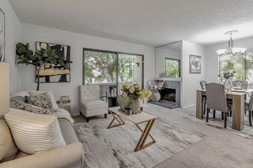 Beautifully updated second-floor condo in the heart of Santa Clara! This 1BR/1BA home in the desirable Woodsborough community features a remodeled kitchen with granite countertops and breakfast bar, spacious living/dining area, recessed lighting, and tiled entry. Enjoy two private balconies with serene views of lush landscaping and peaceful community ponds. The large bedroom includes a walk-in closet and ceiling fan for added comfort. HOA covers hot water, garbage, roof, security patrol, pools, ponds, rec rooms, and moreproviding easy, low-maintenance living. Walk to Central Park, Safeway, restaurants, the library, and top-rated Santa Clara schools (Central Park Elem, Cabrillo Middle, Santa Clara High). Minutes to Apple, Nvidia, Kaiser, and other major tech campusesno freeway needed! Conveniently located near Homestead Rd, expressways, and freeways. The Woodsborough community offers mature trees, open lawns, and great amenities. Comfort, convenience, and location all in one!