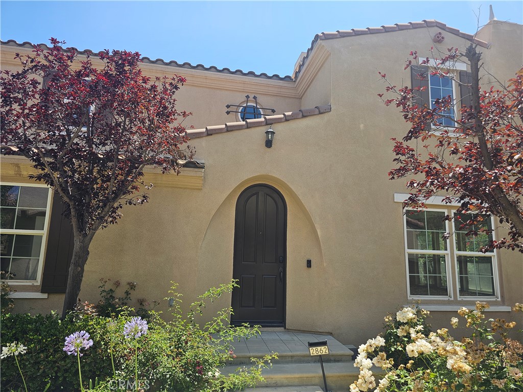 Welcome to this stunning 4-bedroom, 3-bathroom home in the highly sought-after community of Dos Lagos! Thoughtfully designed for both comfort and style, this residence offers an inviting open floor plan with high ceilings and abundant natural light. The spacious kitchen features sleek countertops, ample cabinetry, and modern appliances, flowing seamlessly into the cozy family room—perfect for entertaining or unwinding by the fireplace. A convenient downstairs bedroom and full bath make for an ideal guest suite or home office. Upstairs, the primary suite is a retreat of its own, boasting vaulted ceilings, a spa-like ensuite with a soaking tub, walk-in shower, dual sinks, and a generous walk-in closet. The remaining bedrooms are well-sized, offering comfort and privacy. Step outside to a cozy and private enclosed patio, where you can relax and enjoy the scenic mountain views. The home is ideally located near award-winning schools, walking distance to Dos Lagos shopping, dining, and outdoor recreation, with easy access to the 91 and 15 freeways.
Don’t miss this incredible opportunity—schedule a showing today!