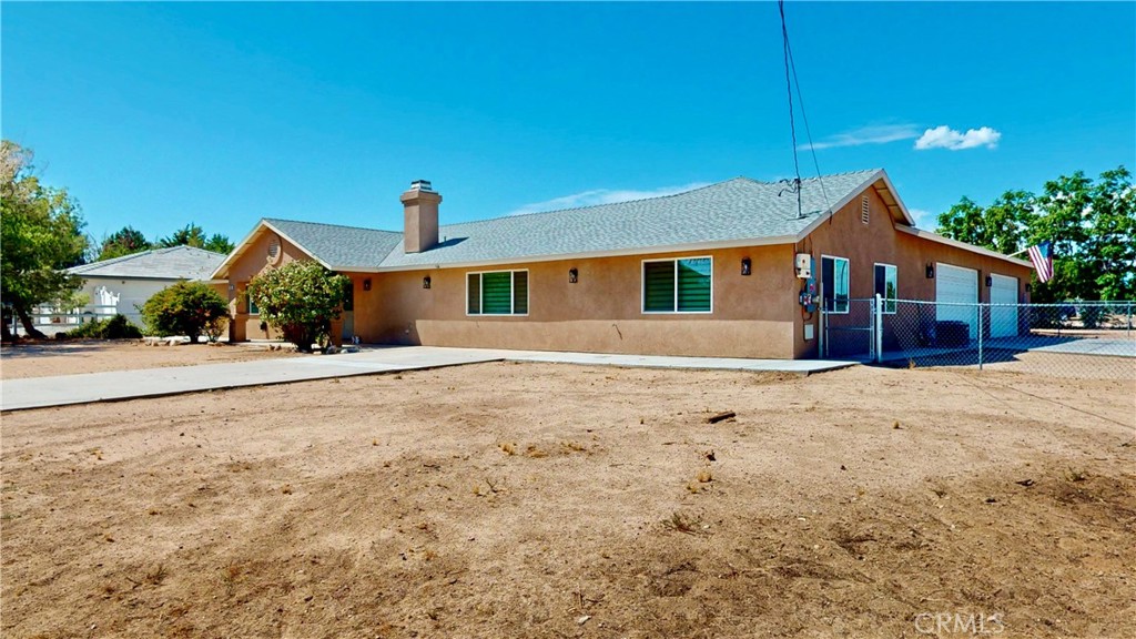 Welcome to 7610 Glider Ave in Hesperia! This beautifully remodeled residence offers an impressive 4,205 sq. ft. of living space on an expansive 24,700 sqft. lot. Designed with comfort, style, and versatility in mind, the home features two master bedrooms, perfect for multi-generational living or private guest accommodations. Inside, you’ll find a large open Kitchen with a prep sink on the Island and a large walk in pantry. There is a huge game room with a wet bar and plenty of storage cabinets. This home has multiple living areas, and tasteful modern upgrades throughout that create a fresh and inviting atmosphere. The open floor plan offers seamless flow, providing plenty of room for entertaining or enjoying quiet family evenings. Step outside to a spacious covered back patio, ideal for summer barbecues or relaxing under the High Desert skies. The property also boasts a 4-car garage complete with a convenient half bath, along with an oversized yard that provides endless potential—whether for RV parking, outdoor projects, or creating your dream backyard oasis. Combining size, functionality, and luxury, this home is a rare opportunity you won’t want to miss.